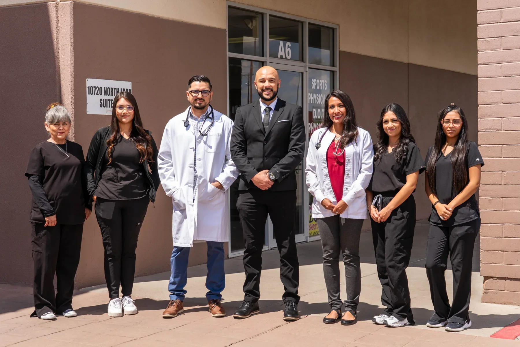 The Socorro Medical Clinic team standing together outside the clinic